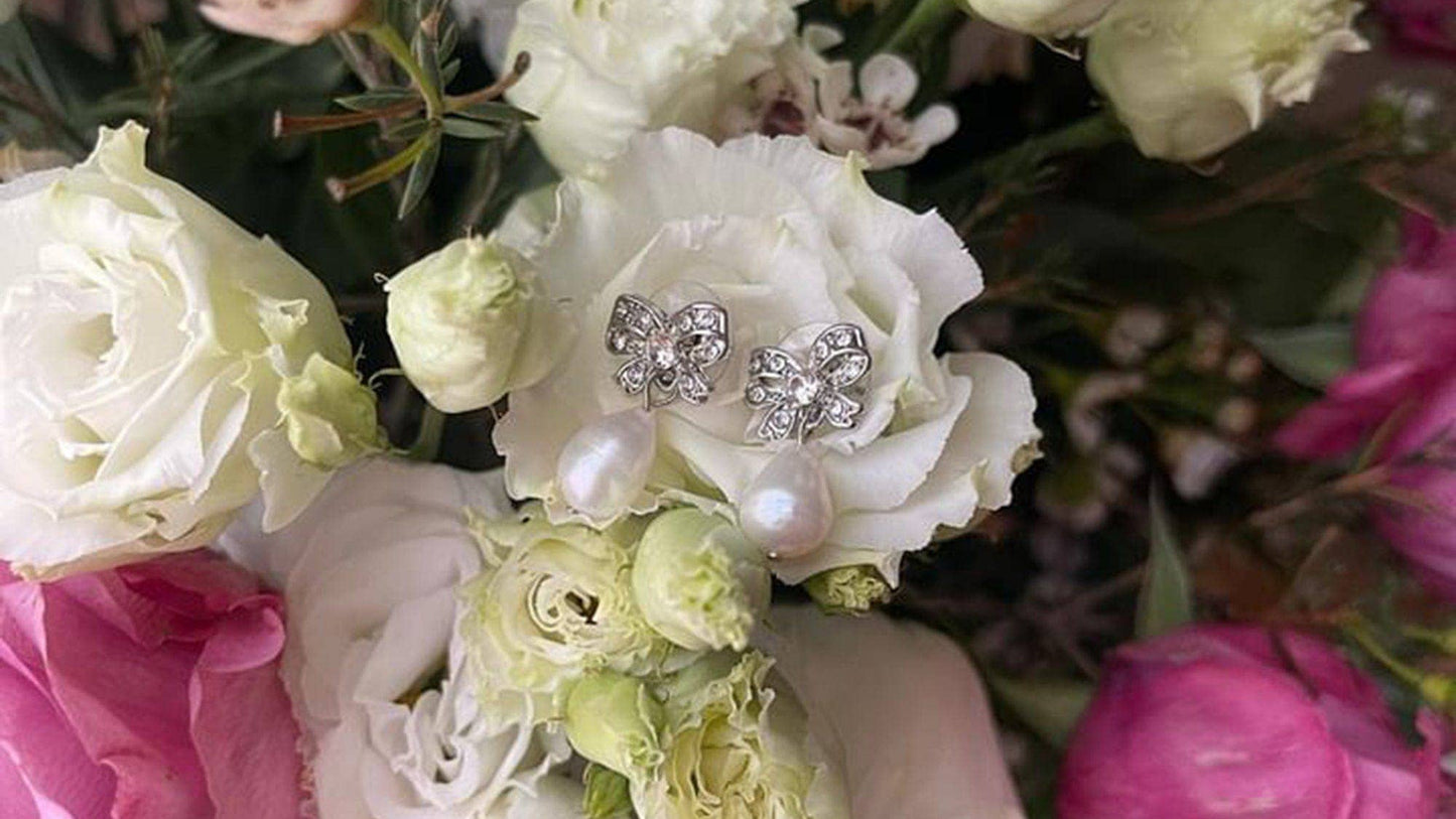 Freshwater pearl bow earrings